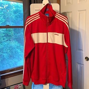 Adidas Red and White track jacket.
